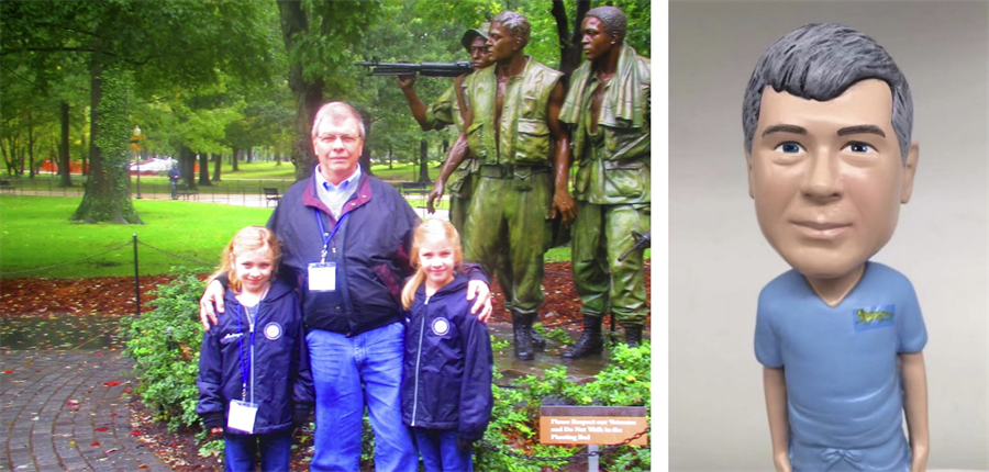 Dr. Burns with his daughters; a bobblehead in Dr. Burns' likeness.